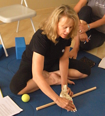 Jenny Otto teaching pole work